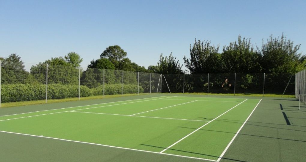Béton poreux court de tennis